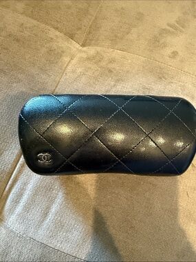 Black Chanel sunglass case